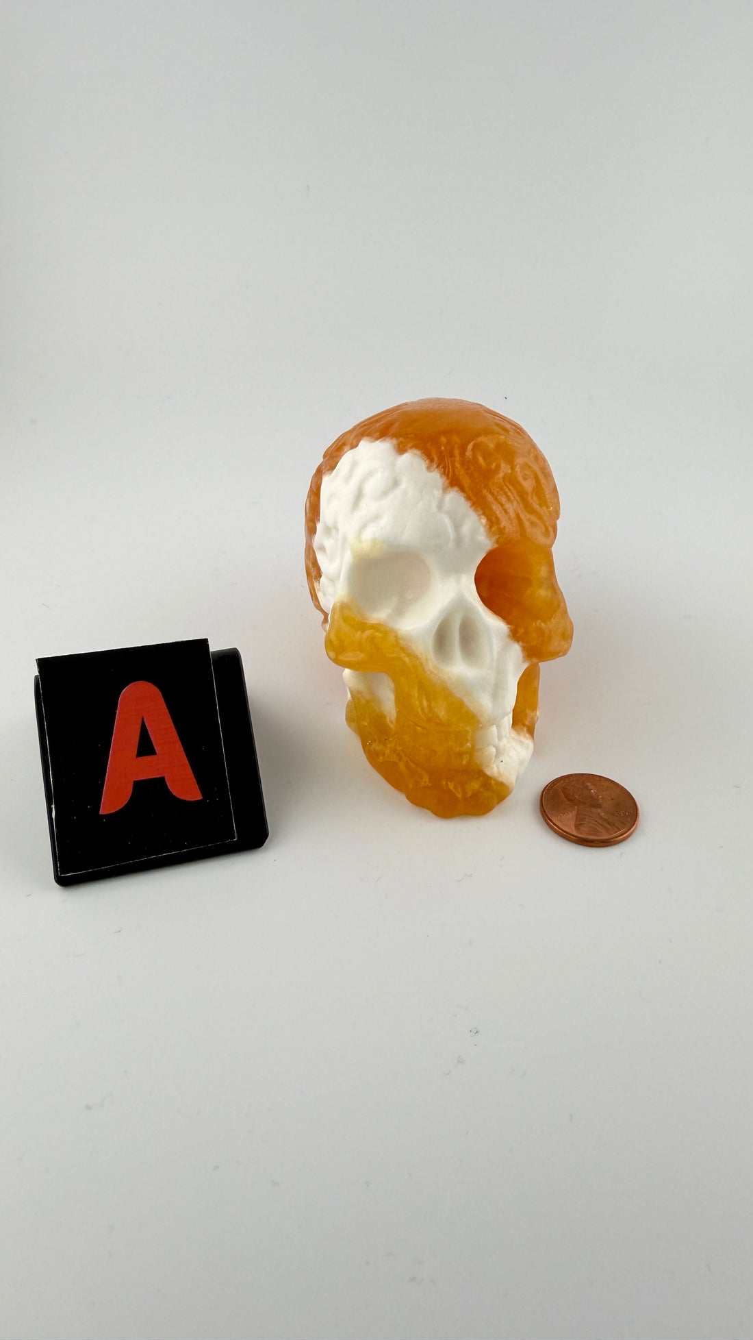 Orange Calcite Skulls