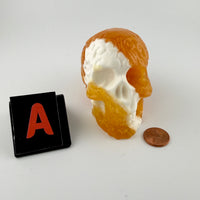 Orange Calcite Skulls