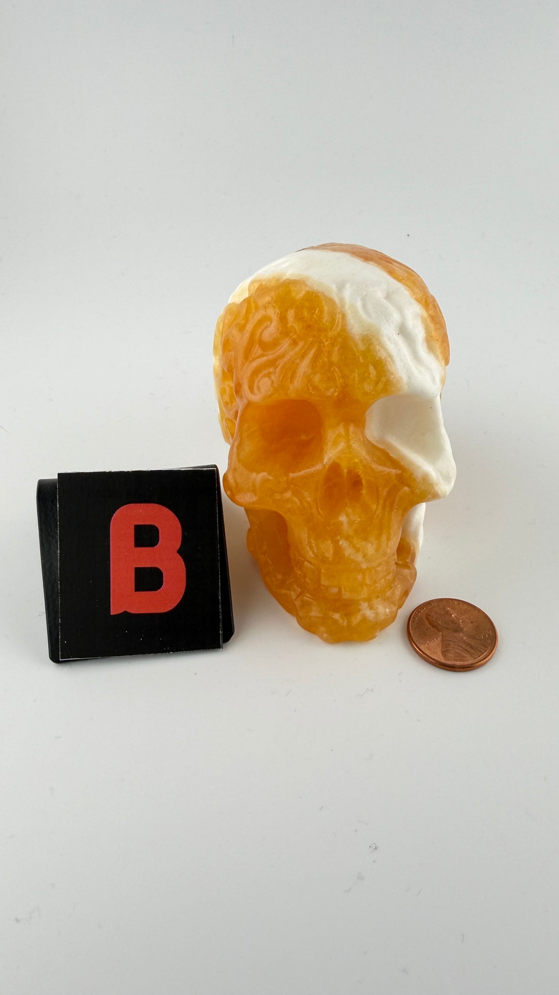 Orange Calcite Skulls