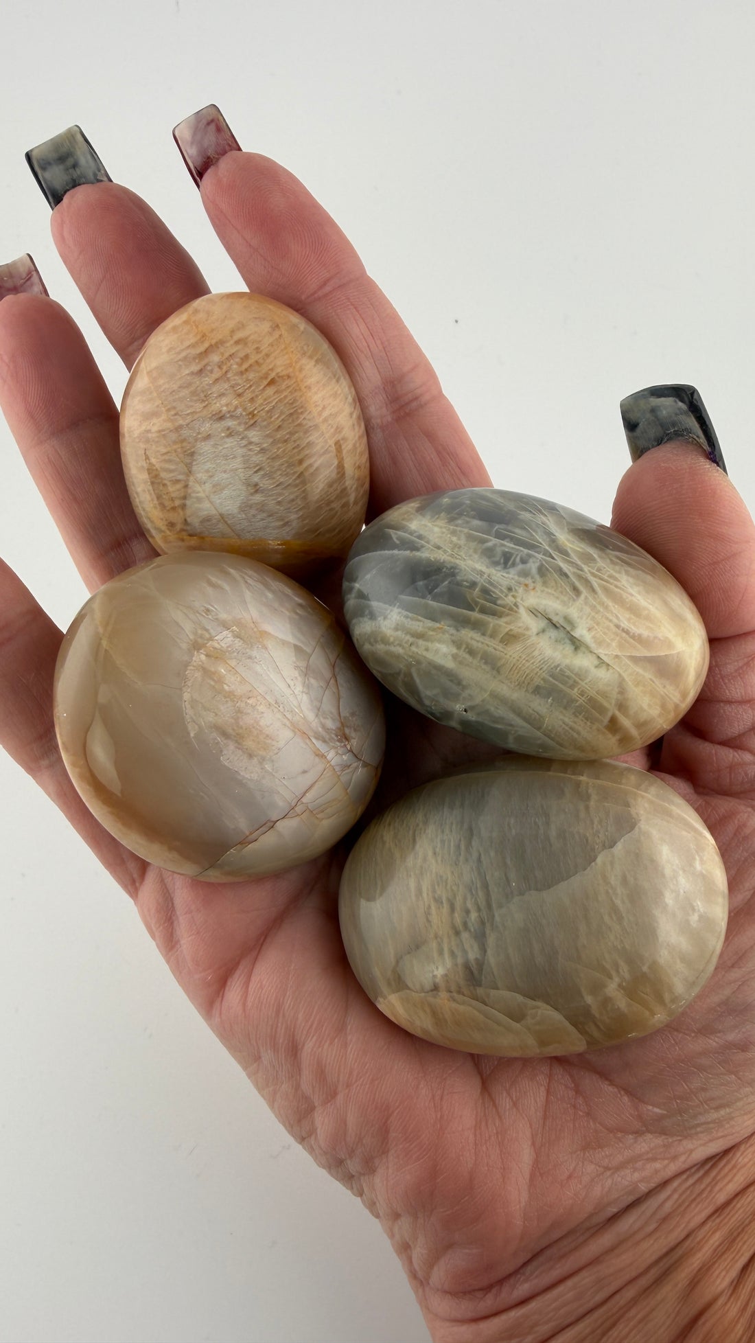 Peach/Black Moonstone Palm Stone